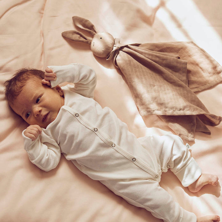 Strampler mit Füßen