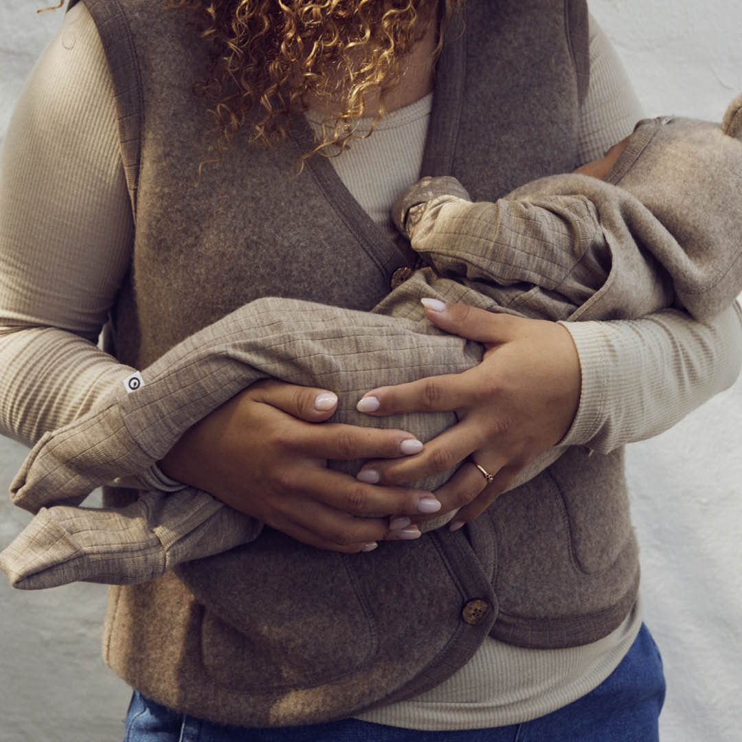 Strampler mit Füßen aus Merinowolle