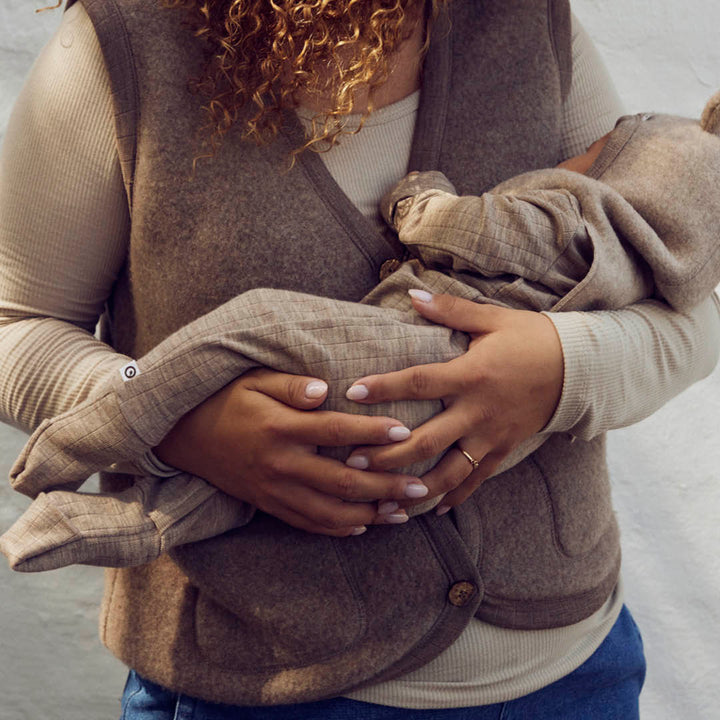 Strampler mit Füßen aus Merinowolle